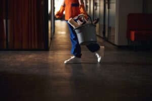Janitorial cleaning supplies for summer – Essex café staff using cleaning products to manage increased footfall, including mops, surface cleaners, and hand sanitiser